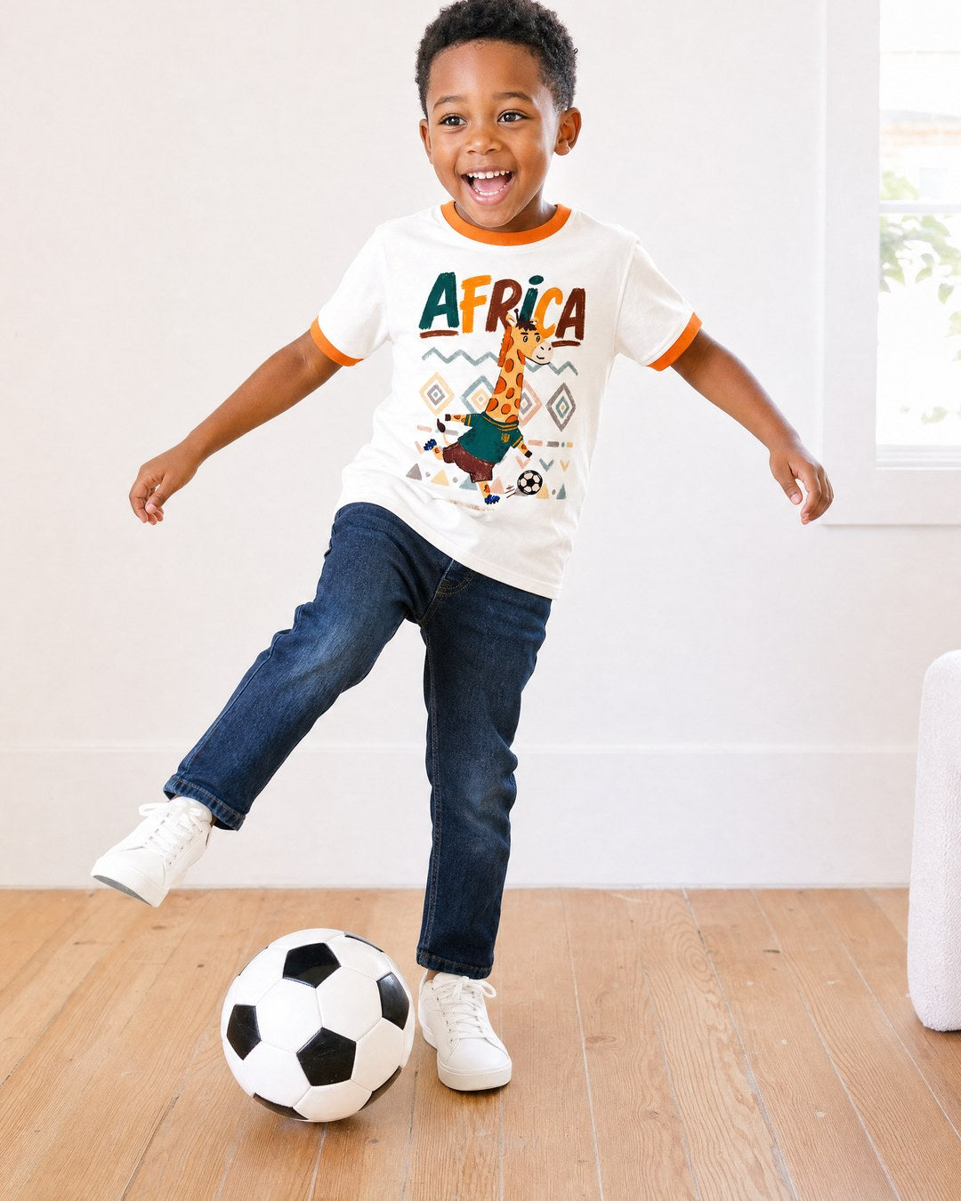 Africa giraffe soccer tee on child model