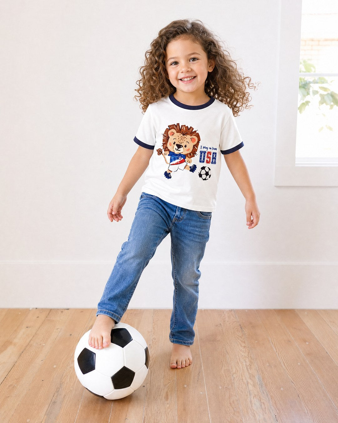 USA lion soccer tee on child model