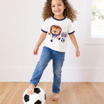 USA lion soccer tee on child model